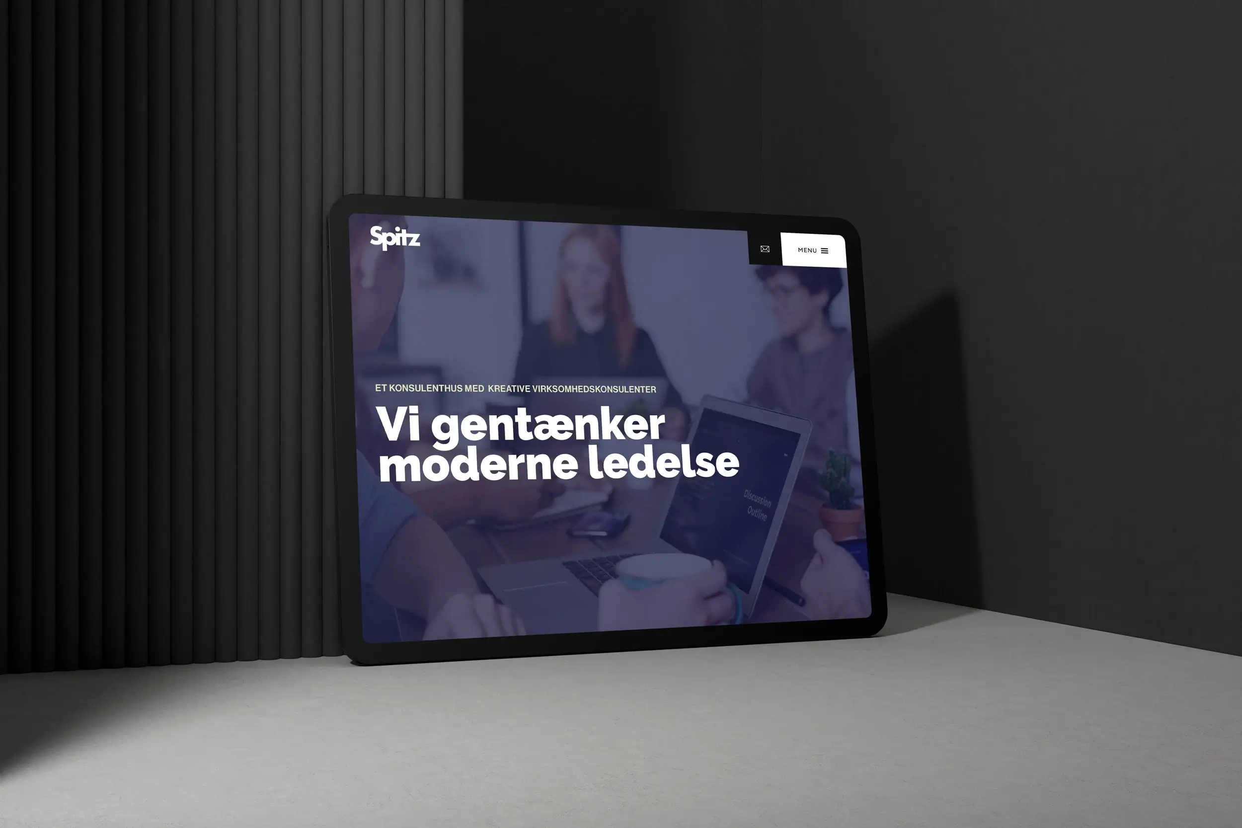 Hjemmeside til konsulenter vist på ipad