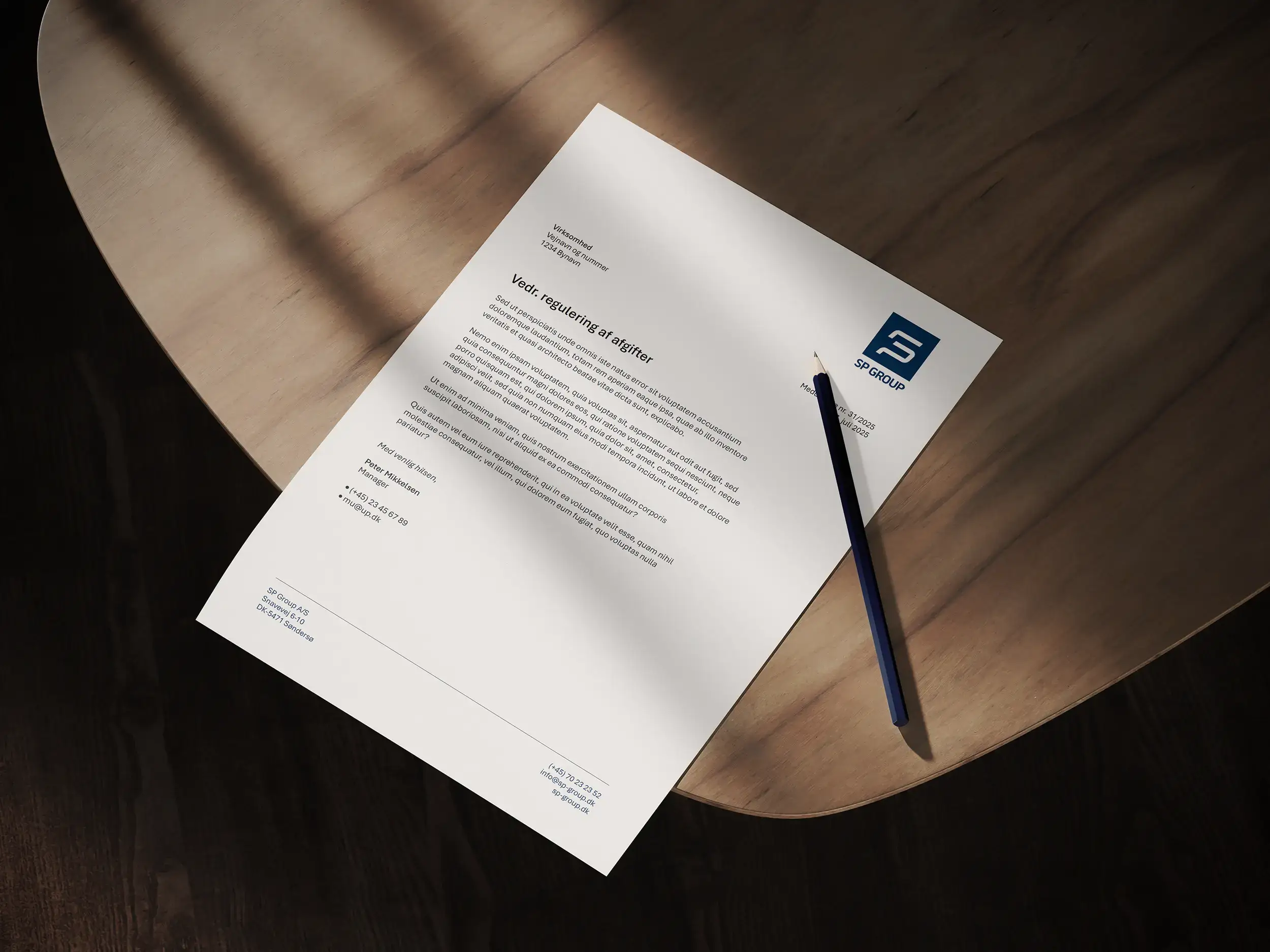 Brevpapir design til SP Group